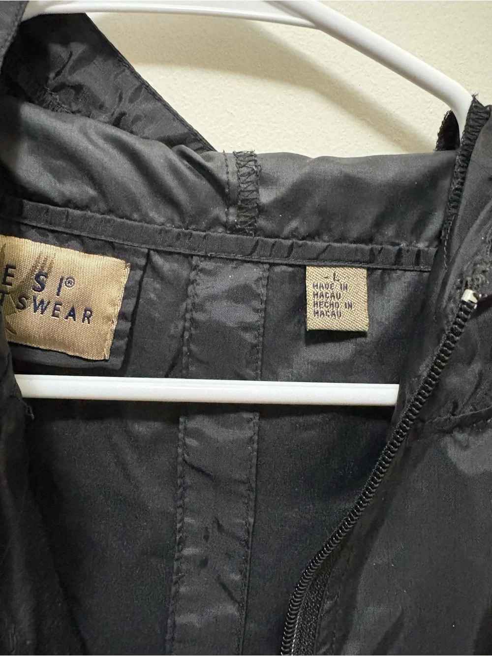 Men's Black Hooded Rain coat with CU Boulder logo.